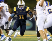 East Tennessee State linebacker Chandler Martin (11) rushes a passer. The Arabia Mountain alum had 23 tackles to set a new school record in a game against The Citadel.