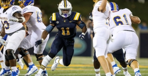 East Tennessee State linebacker Chandler Martin (11) rushes a passer. The Arabia Mountain alum had 23 tackles to set a new school record in a game against The Citadel.