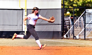 Chamblee second baseman fielded a grounder going to her left and tossed it to first for an out during Chamblee's 9-1 win over McIntosh. (Photo by Mark Brock)