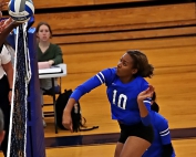 Chamblee's Layla Burrell slams a kill home during the Bulldogs 3-1 Class 5A first round state playoff victory at Chamblee on Tuesday. (Photo by Mark Brock)