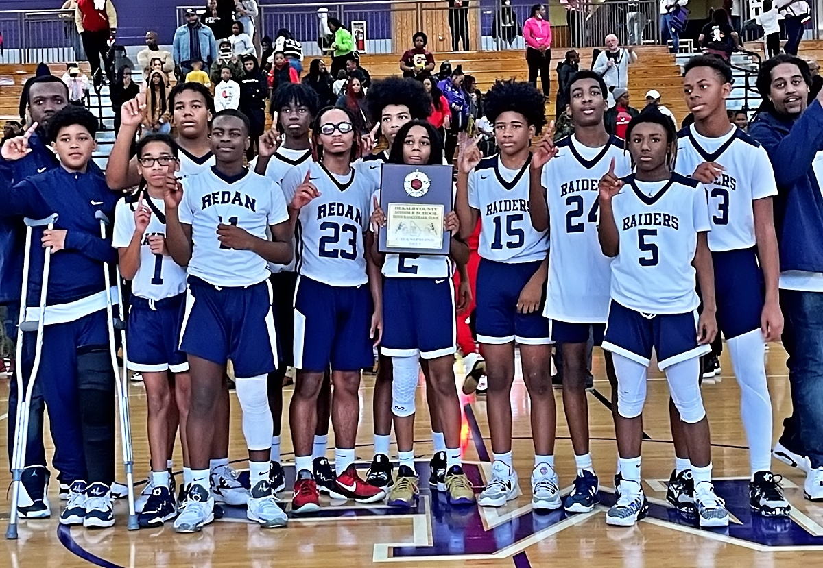 The Redan Raiders rallied in overtime against the Chapel Hill Panthers to win the programs first DCSD Middle School Boys' Basketball Championship.
