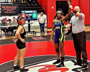 Two DeKalb County girls' wrestlers hope to meet in a championship match for the third time this year in the GHSA State Wrestling Tournament this weekend. Say Paw of Stone Mountain (left) and Southwest DeKalb's Cassidy Gibson who won their state sectional championship match begin their trek for a title tomorrow in Macon.