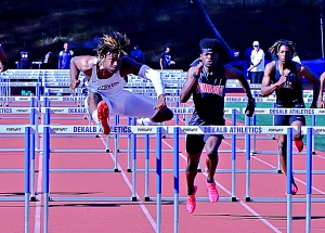 Southwest DeKalb's Isaiah Taylor (left) swept the hurdle events. He outdistanced Dunwoody's Blake Williams for the gold in the 110 hurdles. (Photo by Mark Brock)