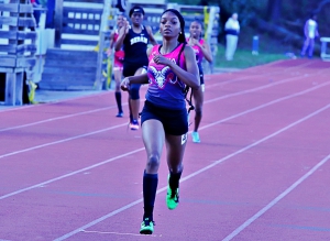 Arabia Mountain's Trinity Balfour won gold i n the 200-meter and 400-meter dashes and was named MVP for her contributions to the Lady Rams win. (Photo by Mark Brock)