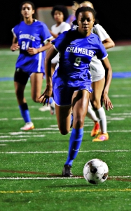 Chamblee's Gabby King (9) moves upfield during Chamblee's win over Midtown. King scored one of the three second half goals by the Lady Bulldogs. (Photo by Mark Brock)