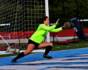 Chamblee goalkeeper Mary Entreckin moves over to deny a shot during Chamblee's 6-3 win over Cambridge in the Class 5A girls' quarterfinals at Cambridge. Entrekin had 9 saves in the match. (Photo by Mark Brock)