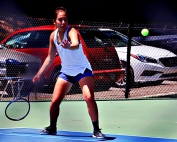 Chamblee's Isabelle Coursey lines up a shot in her No. 1 singles victory. (Photo by Mark Brock)