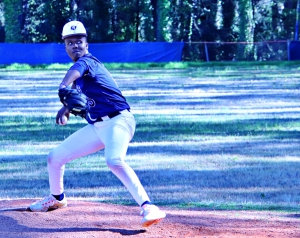 Redan's Jade Johnson pitches during a regular season game against Columbia. Johnson and his teammates swept Drew 9-2 and 13-0 to advance to the Class 2A Sweet 16 playoff round. (Photo by Mark Brock)