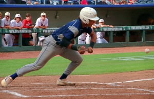 Redan's Adriel Martinez bunted during last year's Class 3A state championship round. Martinez was 5-6 with four RBI in the first round of the Class 2A state playoffs last Monday. (Photo by Mark Brock)