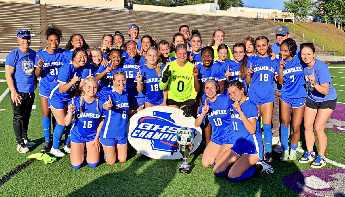 The Chamblee Lady Bulldogs posed as Class 5A girls' soccer state champions for the second consecutive year following a 9-0 shutout of No. 4 ranked Greenbrier. (Photo by Mark Brock)