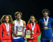 These two sets of twins are setting the bar high in DeKalb County track and field accounting for 13 medals in state competition this season along. The group includes (l-r) Sole Frederick (Druid Hills), Isaiah Taylor (SW DeKalb), Sanaa Frederick (Druid Hills) and Xzaviah Taylor (SW DeKalb). (Photo by Vincent Myers)