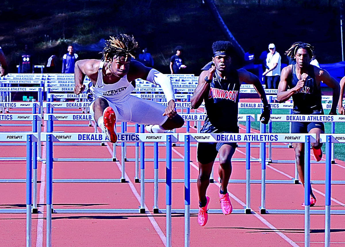 Southwest DeKalb senior hurdler Isaiah Taylor (Left) wins the DCSD 110-meter hurdles and now has the Georgia Gatorade Male Track and Field Athlete of the Year Award. This marks the sixth time for a Panther to win the award. (Photo by Mark Brock)