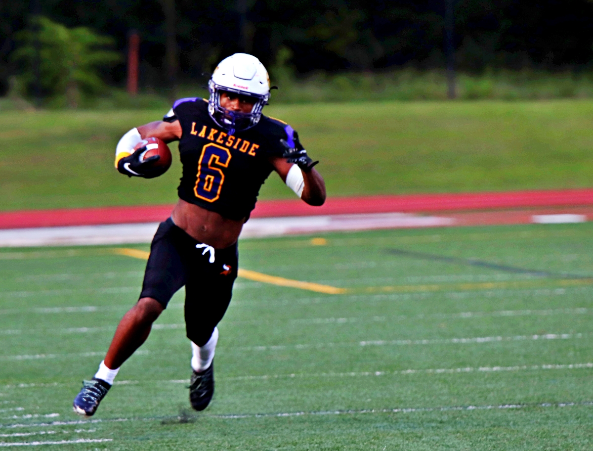 Lakeside running back Jon-Luc Noison got loose for 200 rushings yards and two touchdowns in the Vikings' season opening 26-6 win over Berkmar at Adams Stadium on Thursday night. (Photo by Mark Brock)