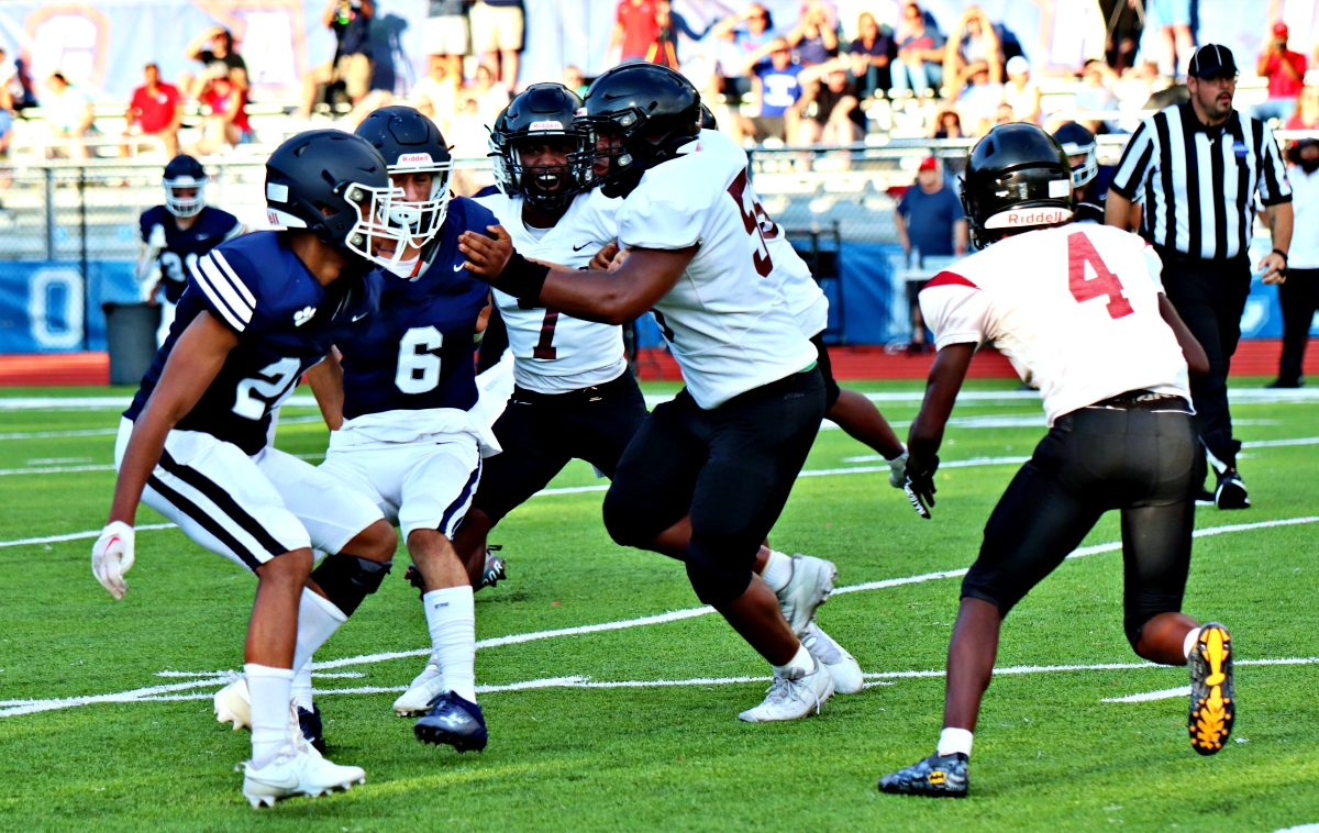 Towers' Jaylen Robinson (4) eyes an opening near the goal line in scrimmage action against Dunwoody. (Photo by Mark Brock)