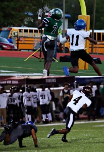 Arabia's Alex Richard (7, top) and Tucker's Christian Whitmore (4, bottom) will be vying for big play capability in the battle for the Region 4-5A title at Adams Stadium on Friday night. (Photos by Mark Brock)