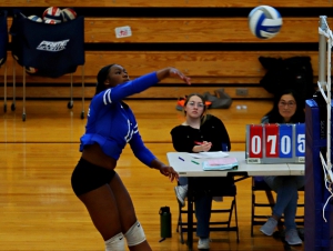 Chamblee's Nayla Norman puts one away against Ware County on an assist from Natalie Tsai. Norman had 17 kills and Tsai tallied 32 assists in the match swept 3-0 by Chamblee. (Photo by Mark Brock)