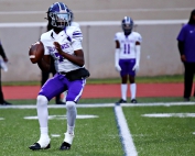 Miller Grove quarterback Amonte Harden threw for 292 yards and three touchdowns for the Wolverines. (Photo by Mark Brock)