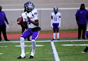 Miller Grove quarterback Amonte Harden threw for 292 yards and three touchdowns for the Wolverines. (Photo by Mark Brock)