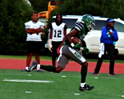 Arabia Mountain's Kenneth Hollinger (shown here returning a pick-six against Locust Grove) has six interceptions on the season as part of the stout Arabia Mountain defense. (Photo by Mark Brock)