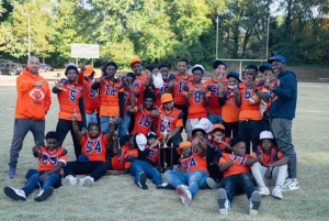 The John Lewis Middle School Lions knocked off defending champions Crawford Long Tigers 22-0 to advance to the APS-DCSD Middle School Football Challenge. (Courtesy photo)