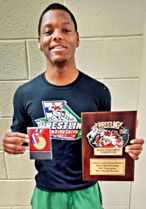 Miller Grove's Tyrone Williams wrestled his way to the 144-weight class gold medal in the DeKalb County Wrestling Championships and earned the meet's Most Valuable Wrestler Award. (Courtesy Photo)