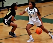 Arabia Mountain freshman guard Shanya Heath (5) makes a play against Tucker earlier this season. She came up big with 22 points in the Rams 62-42 home playoff win over Jenkins. (Photo by Mark Brock)