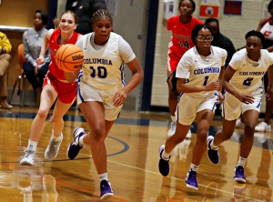Columbia's Kendall Campbell (10) leads a fastbreak following her steal against Providence Christian. Columbia advanced to the Class 2A Sweet 16 with a 62-35 win over the Storm. (Photo by Mark Brock)