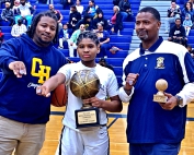 Coaches Stephon Broughton (left) and Ronald Moye (right) celebrate an undefeated and state title with two-time postseason MVP Mauri Barnes (middle). (Courtesy Photo)