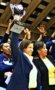 Southwest DeKalb girls' basketball head coach Kathy Richey-Walton celebrates one of her five state championships. (Photo by Mark Brock)