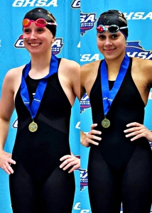 Lyla Richards (left) and Sophia Hook (right) combined for three gold medals to lead the Lakeside Lady Vikings to a fourth place finish in the Class 6A GHSA GIirls' State Swimming Championships. (Courtesy Photos)
