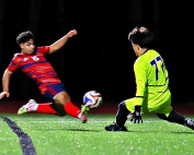South Cobb keeper Yeshua Carbajal (77) won this battle with Dunwoody's Jordi Orellana (8), but just minutes later Orellana put a header into the goal on a Will Lamb corner kick. (Photo by Mark Brock)