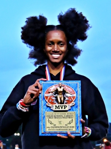 Martin Luther King hurdler India Thorpe was named the MVP of the girls' meet after winning both hurdle events and finishing third in the high jump. (Photo by Mark Brock)