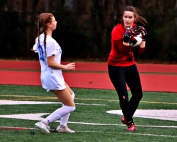 Tucker goal keeper Kaylee Rice (right) defends against Chamblee's Addison Morris (left) during regular season action. Both lead their teams into the Class 5A state playoffs. (Photo by Mark Brock)