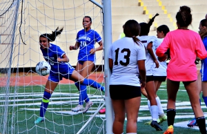 Chamblee's Ansley Harrison (16) puts a header into the net off a corner kick from Cassidy Kuehne on the way to a hattrick in Chamblee's 10-0 win over Coffee in the first round of the Class 5A girls' state soccer playoffs. (Photo by Mark Brock)