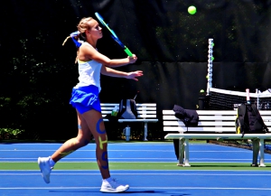 Chamblee's McKenzie Hensarling makes a volley in her shortened match at No. 3 singles. (Photo by Mark Brock)