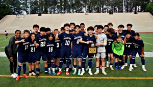 The Peachtree Patriots made it a sweep of the DCSD Middle School soccer titles with a thrilling 4-3 win over the Henderson Cougars. (Photo by Mark Brock)